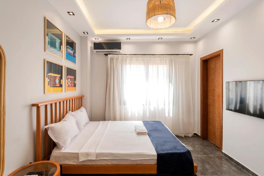 Säng eller sängar i ett rum på Travelholic AUC Residence