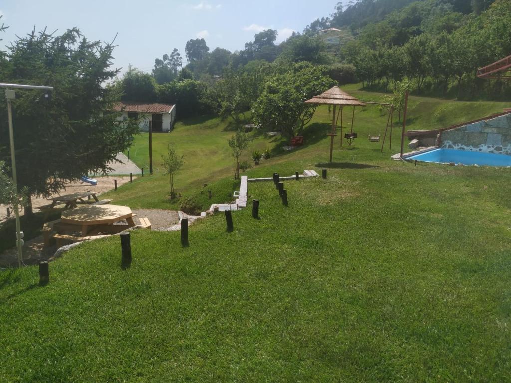 Bazén v ubytování Quinta dos Campos - Apartamento 1 nebo v jeho okolí