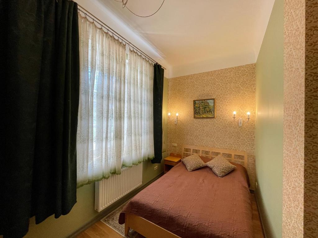 Postel nebo postele na pokoji v ubytování Lielbornes Muiža Boutique Hotel&Recreation Complex