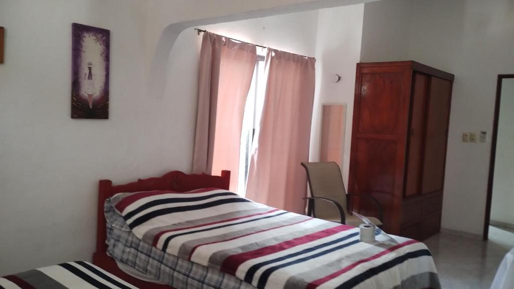 Casa de Luna - Basic Triple Room With Shared Bathroom