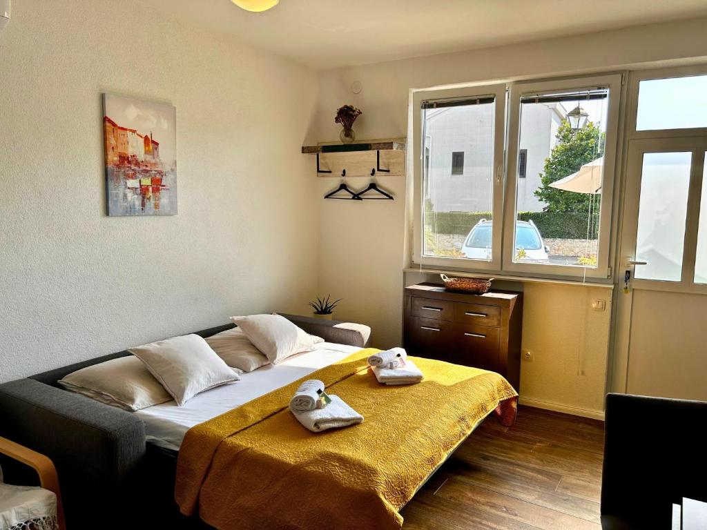 Posteľ alebo postele v izbe v ubytovaní Apartment Pineapple