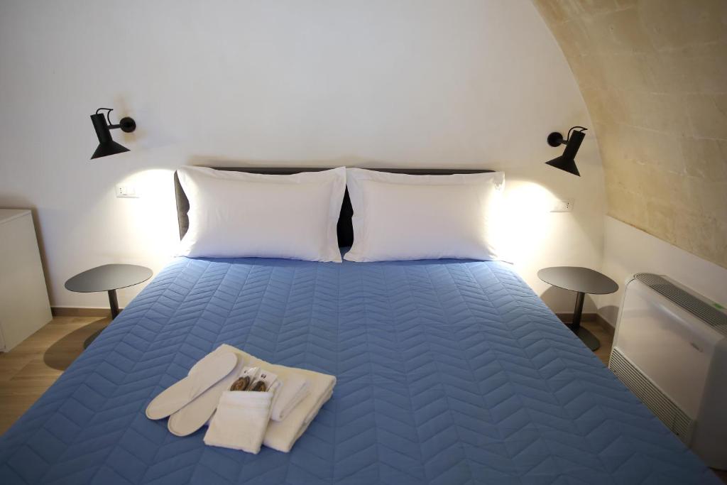 Postel nebo postele na pokoji v ubytování Casa Nera GuestHouse