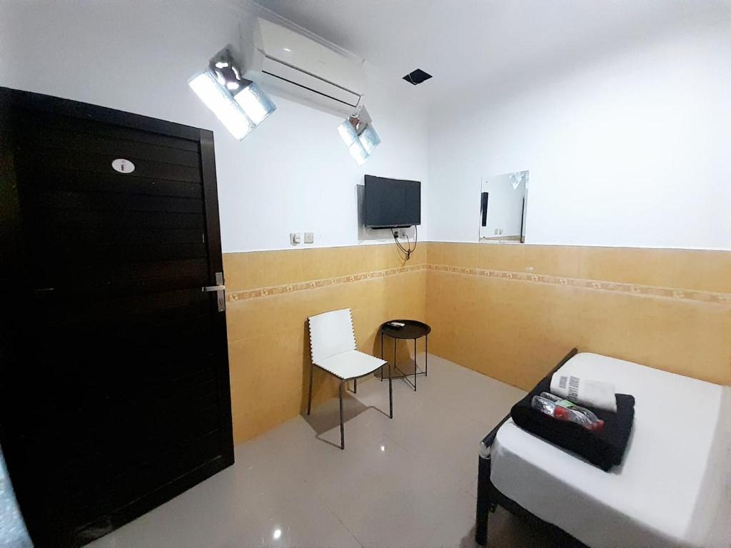 TV a/nebo společenská místnost v ubytování Hotel Srikandi Baru