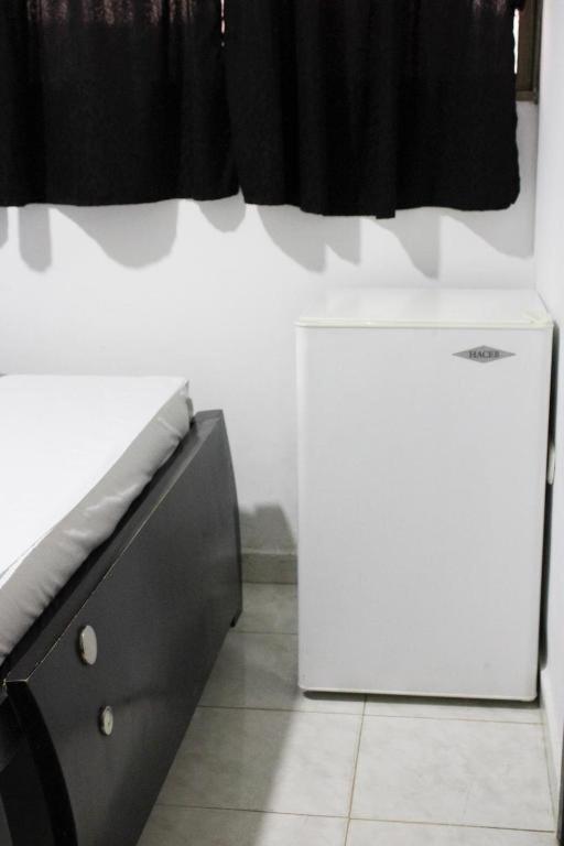 Kuchyň nebo kuchyňský kout v ubytování Hotel Villa Rocio Curumani
