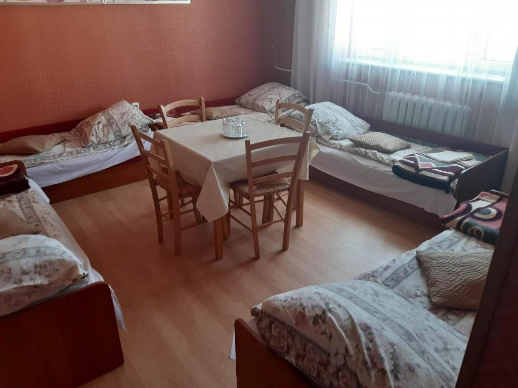 Postel nebo postele na pokoji v ubytování Ośrodek wczasowy Ewa