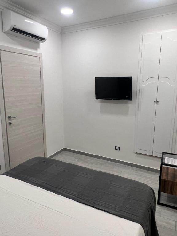 Postel nebo postele na pokoji v ubytování Le Case Col Sole da Silvia INTERNO 3