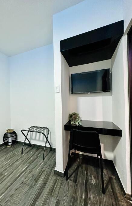 TV a/nebo společenská místnost v ubytování Pasavento - Family Modern Suite