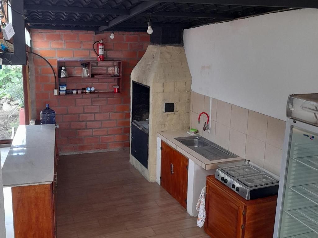 Kuchyň nebo kuchyňský kout v ubytování Casa Verde Descanso 1