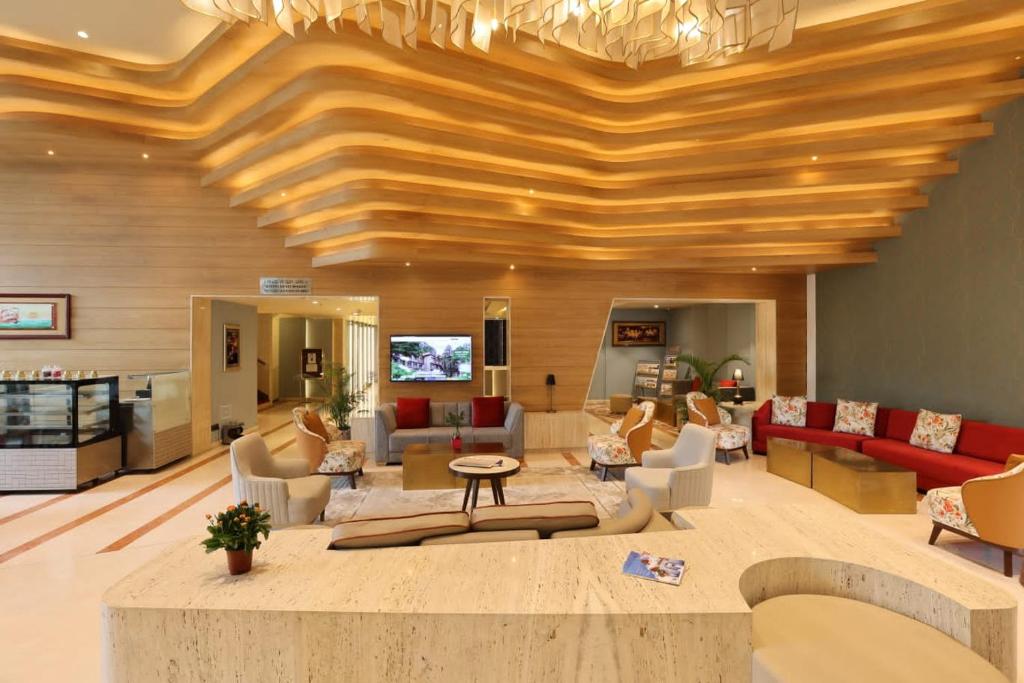 Posezení v ubytování Citadel Sarovar Portico Bengaluru
