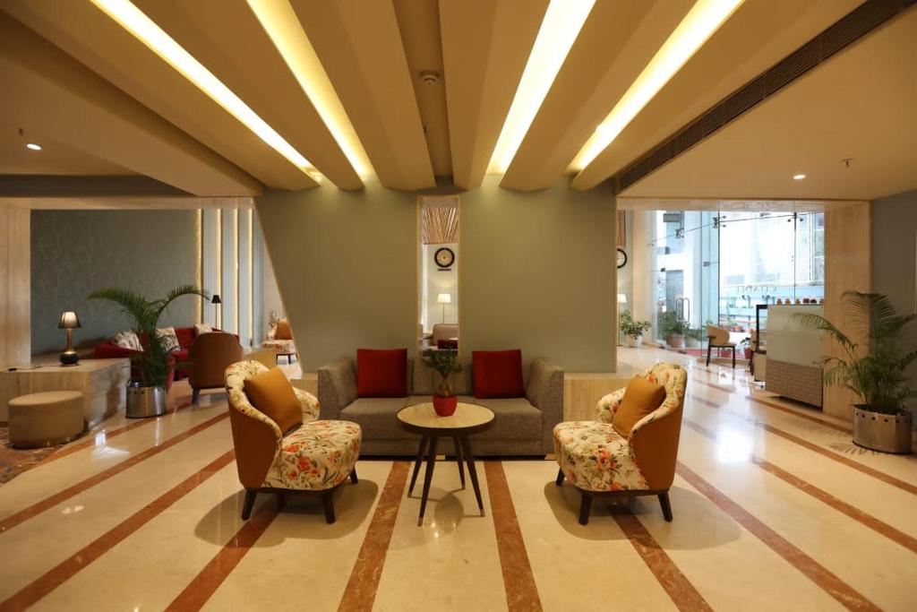 Posezení v ubytování Citadel Sarovar Portico Bengaluru