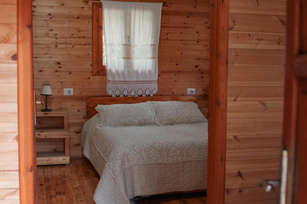 Postel nebo postele na pokoji v ubytování Farma Sotira