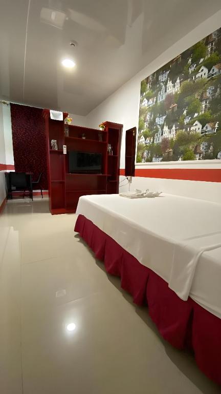 Postel nebo postele na pokoji v ubytování DESTINY'S PLACE HOTEL - STAY COOL THIS SUMMER! COLD ROOMS!! CHEAPEST RATE! NEAR ROBINSONs XENTRO MALL!!