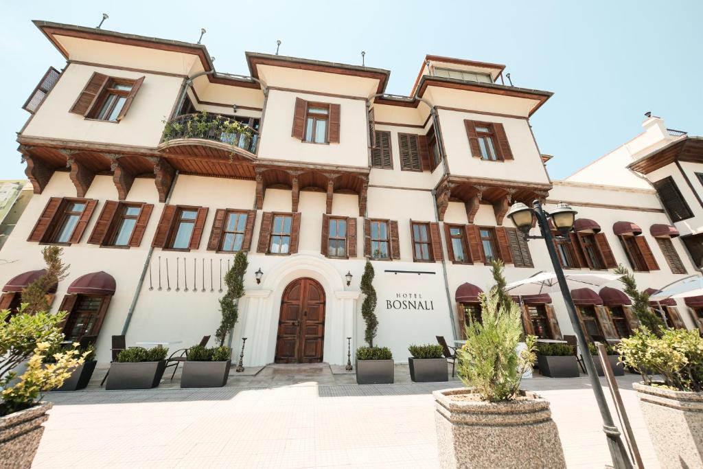 a building in the city of genoa at Hotel Bosnali in Adana