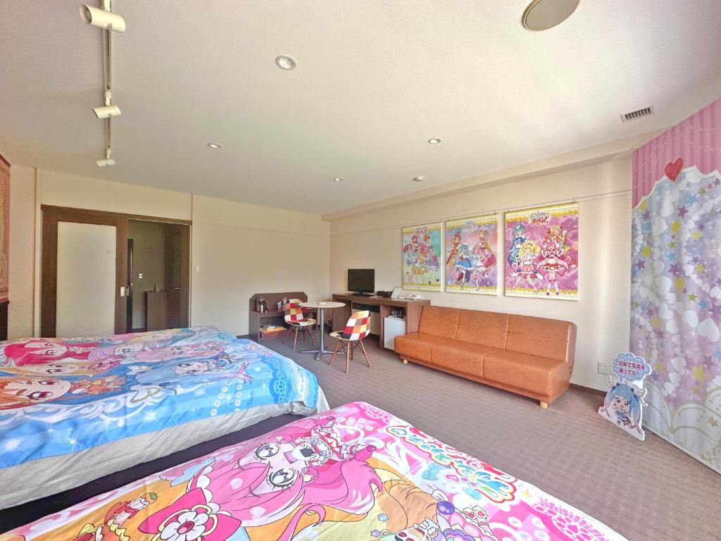 Postel nebo postele na pokoji v ubytování Yuzawa Toei Hotel