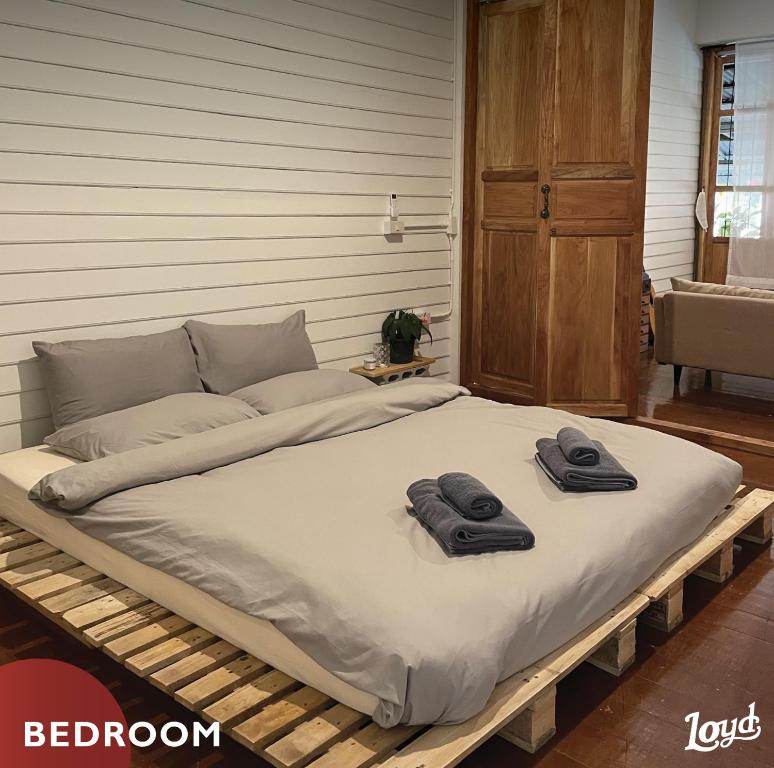 Postel nebo postele na pokoji v ubytování LOYD Ratchaburi