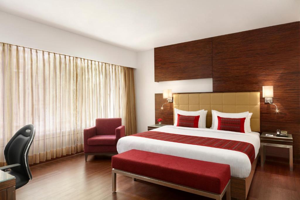 Postel nebo postele na pokoji v ubytování Hotel Suba Star Ahmedabad