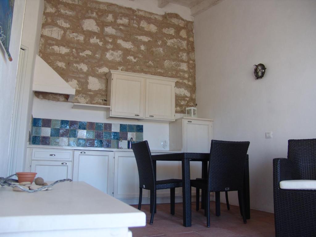 Kuchyň nebo kuchyňský kout v ubytování Residenza A Cova