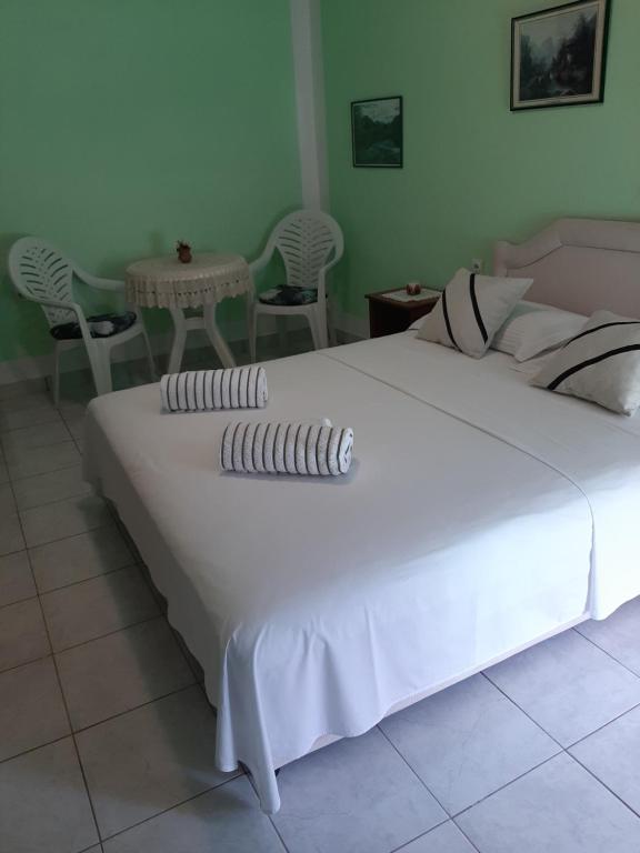 Postel nebo postele na pokoji v ubytování Guest House Aldin
