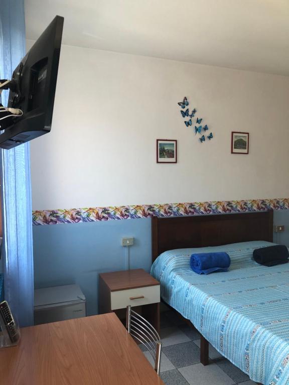 Letto o letti in una camera di Affittacamere Due Mori