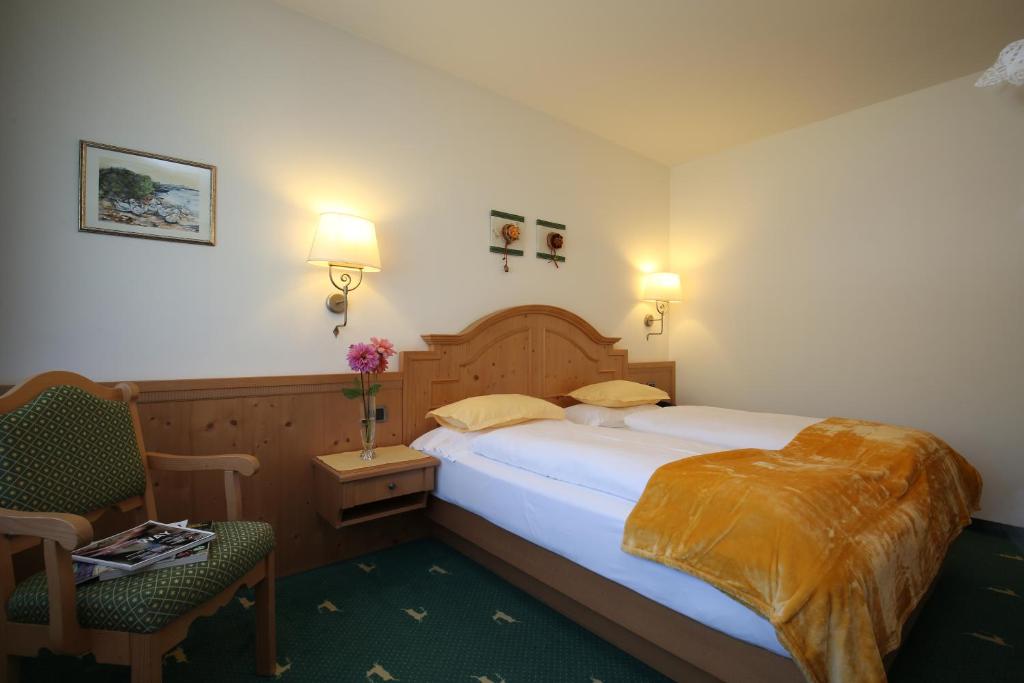 Postel nebo postele na pokoji v ubytování Hotel Mesdi