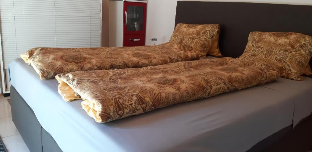 Postel nebo postele na pokoji v ubytování Studio in Domat Ems