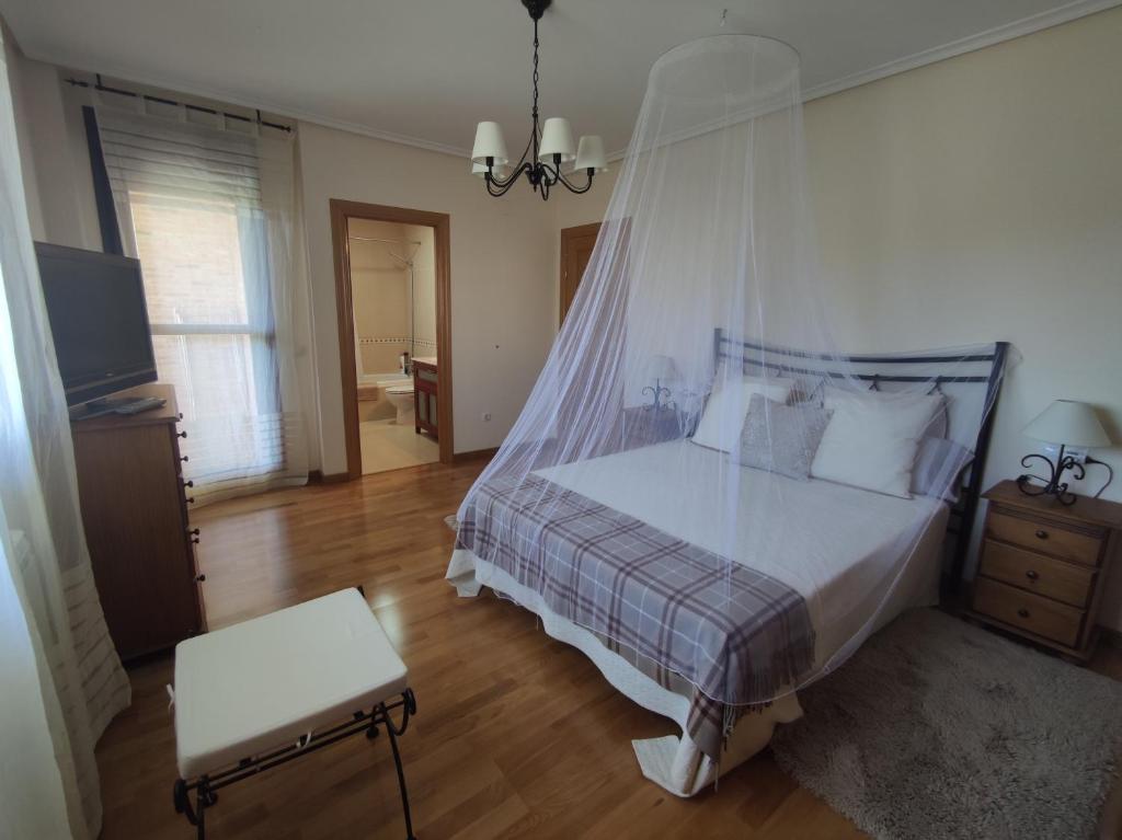Casa San Miguel tesisinde bir odada yatak veya yataklar