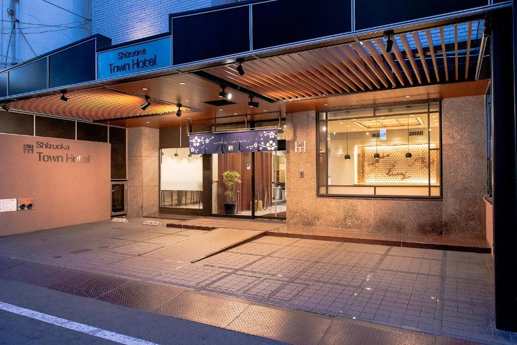 a store front of a building at night at Shizuoka Town Hotel in Shizuoka