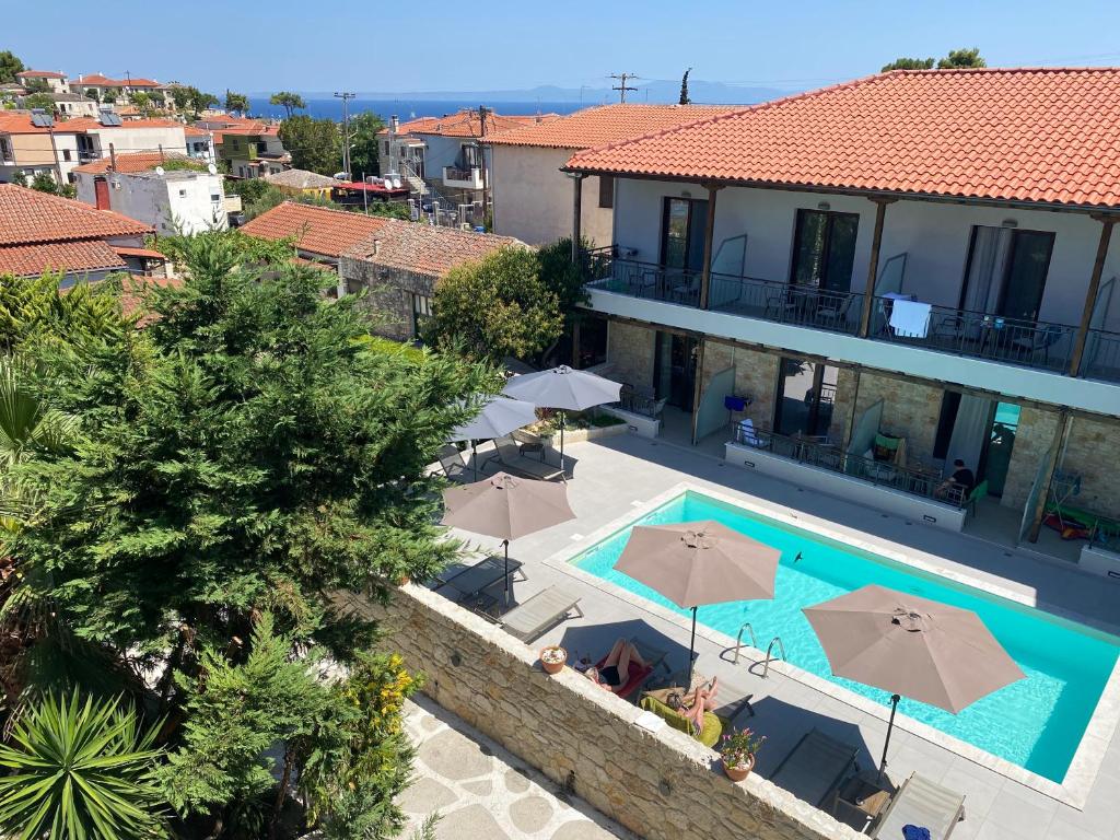 an aerial view of a villa with a swimming pool at Dandelion Afytos in Afitos