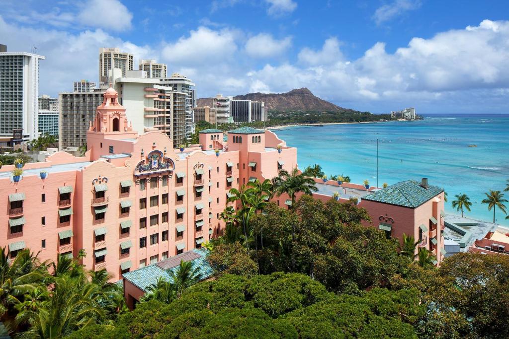 a view of a city with the ocean and buildings at The Royal Hawaiian, A Luxury Collection Resort, Waikiki in Honolulu