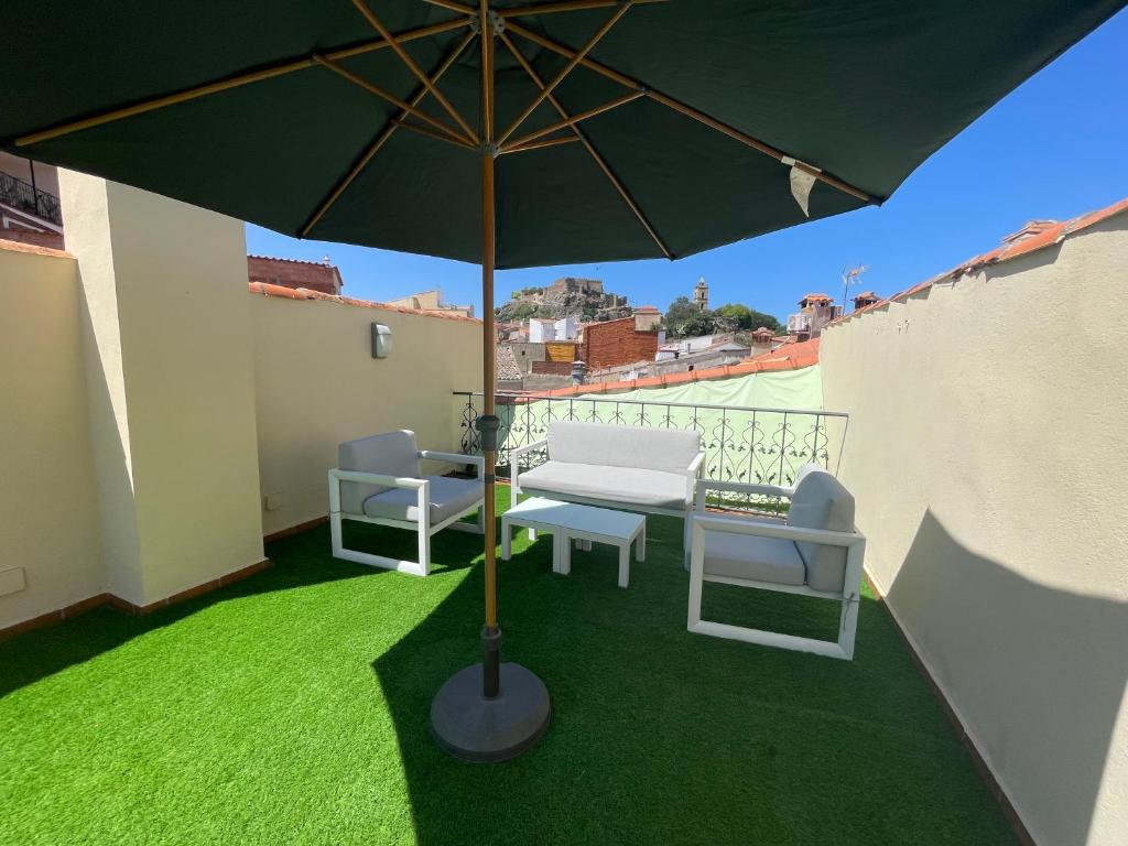 Balkón nebo terasa v ubytování LA CASONA DE BAUTISTA 4 estrellas con piscina montanchez CACERES