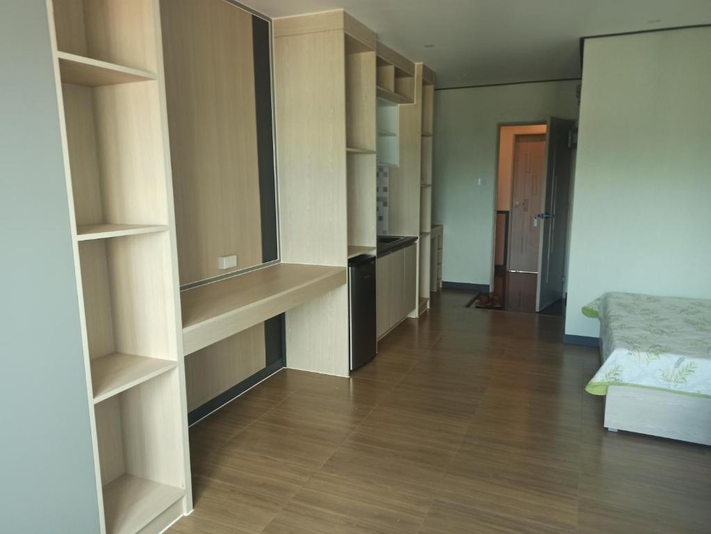 Postel nebo postele na pokoji v ubytování Emmaus condotel