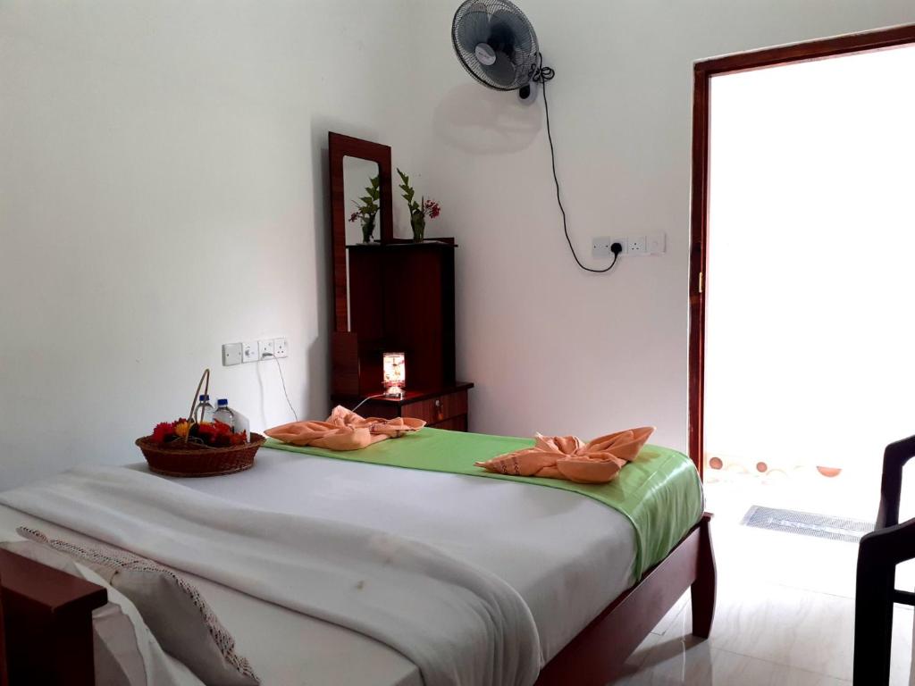 Postel nebo postele na pokoji v ubytování Subash Hotel