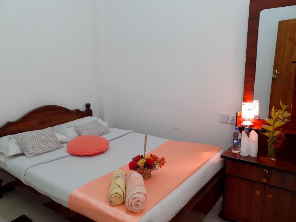 Postel nebo postele na pokoji v ubytování Subash Hotel