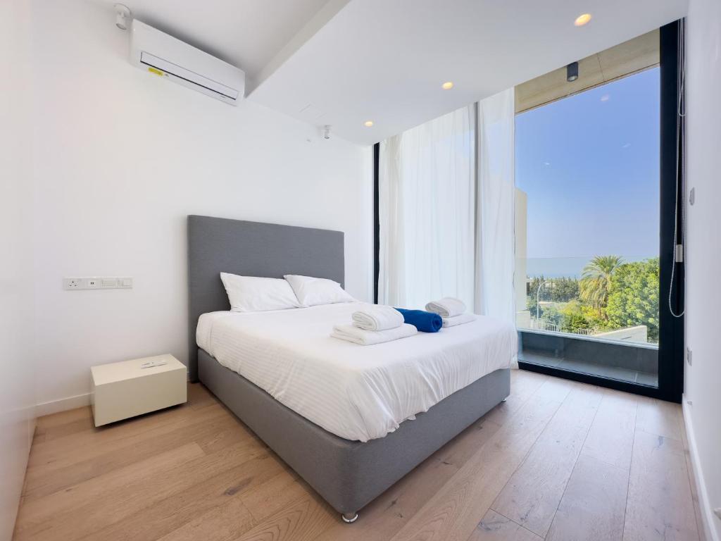 Postel nebo postele na pokoji v ubytování Sunset Park Villas