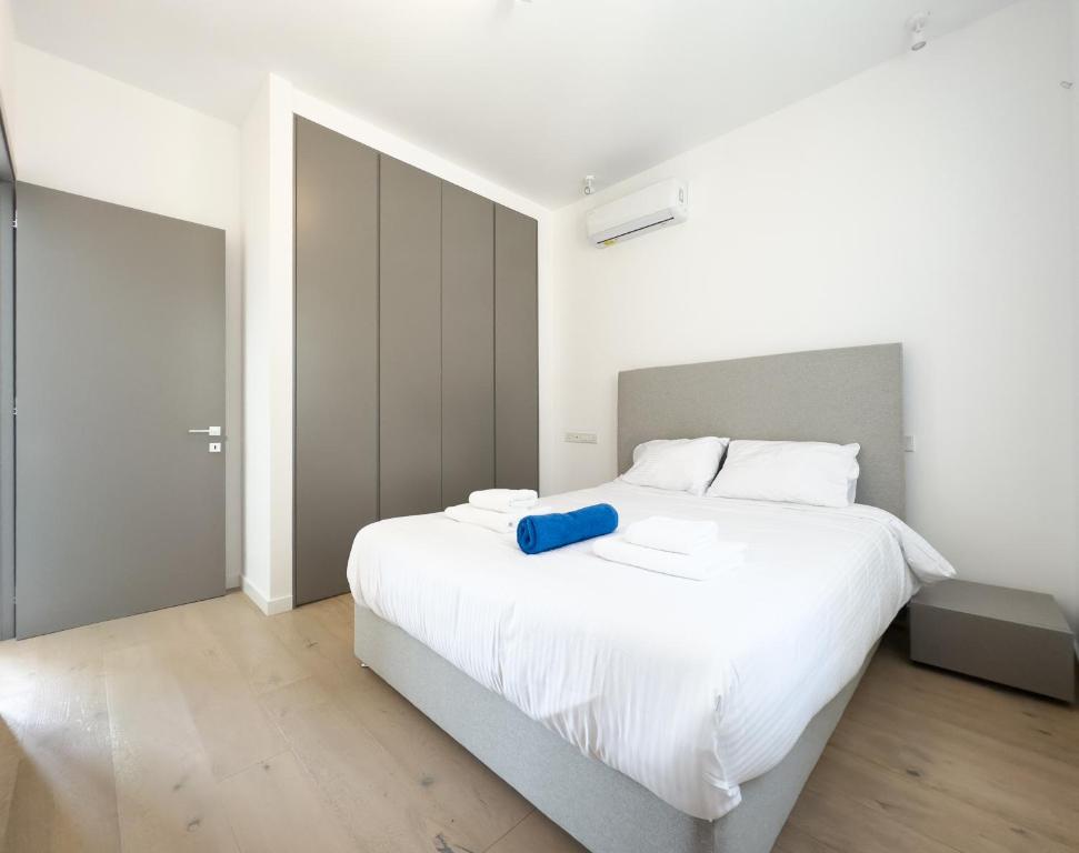 Postel nebo postele na pokoji v ubytování Sunset Park Villas
