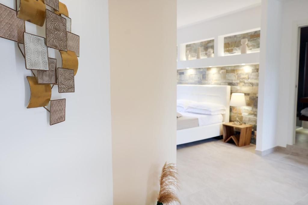 Ένα ή περισσότερα κρεβάτια σε δωμάτιο στο Borgo del Nespolo
