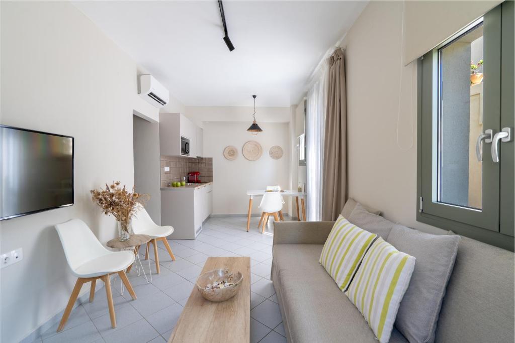 Televízia a/alebo spoločenská miestnosť v ubytovaní Blue View Villas