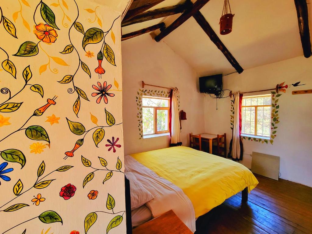 Postel nebo postele na pokoji v ubytování La Casa de Campo