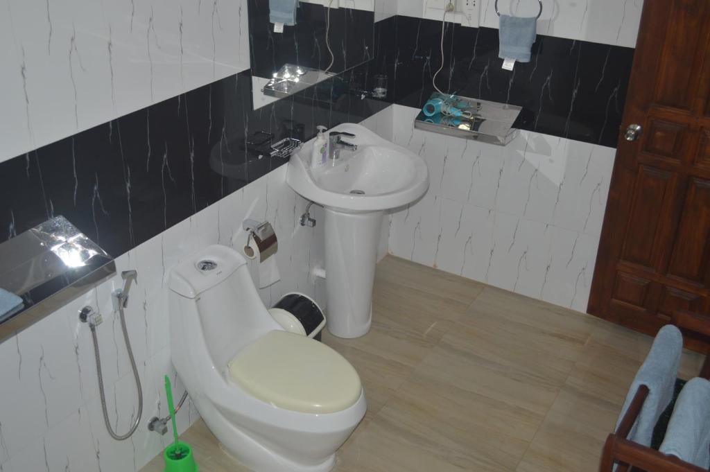 Koupelna v ubytování Amazon Cabanas