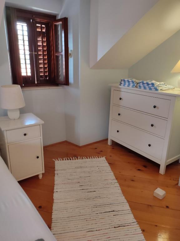 Postel nebo postele na pokoji v ubytování Villa Rustika