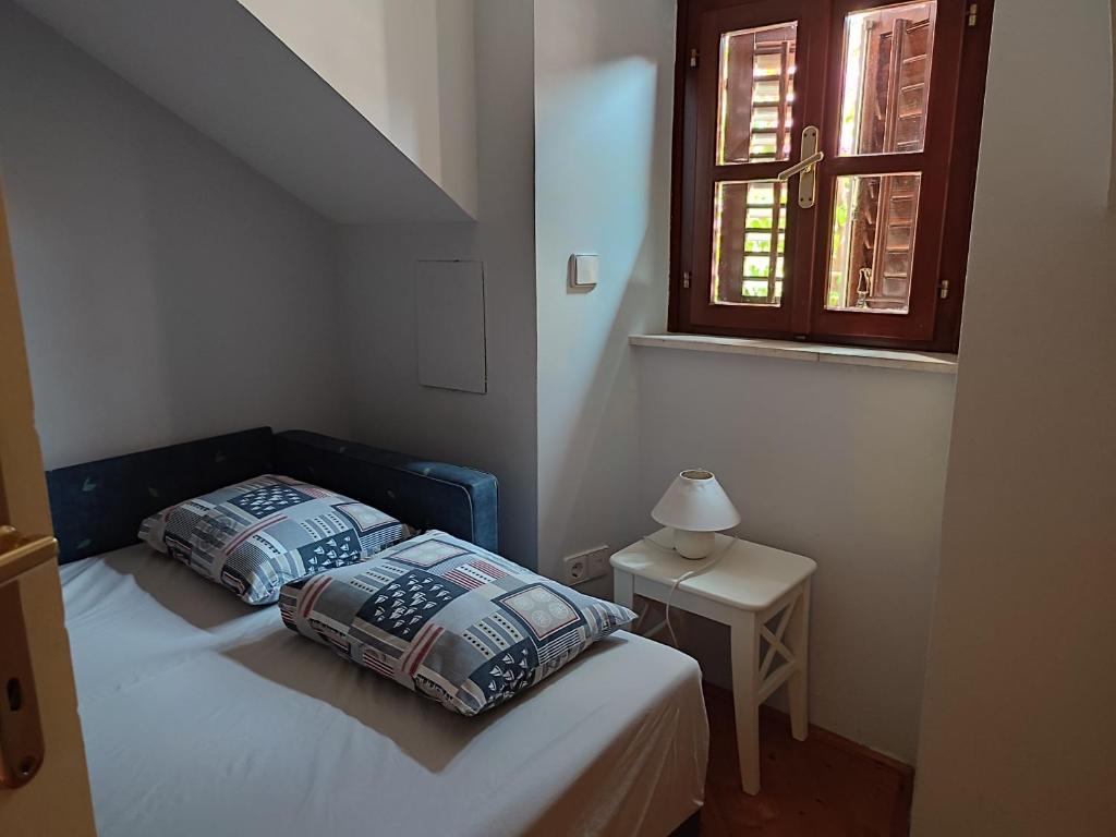 Postel nebo postele na pokoji v ubytování Villa Rustika