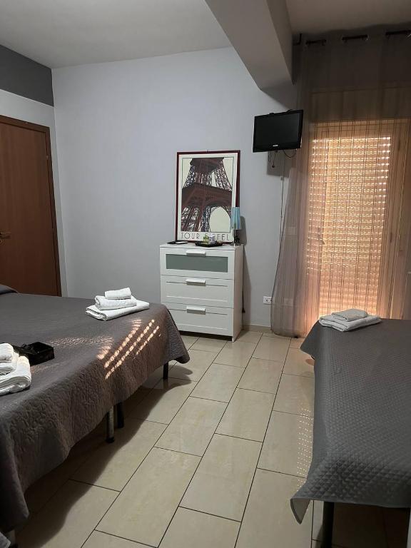 Postel nebo postele na pokoji v ubytování B&B Emmanuel