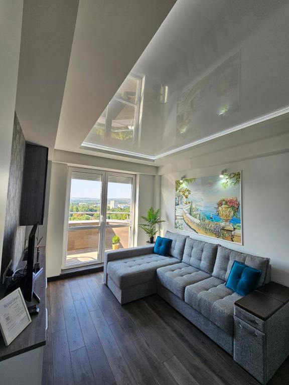 Χώρος καθιστικού στο Apartment Dendrarium Residence