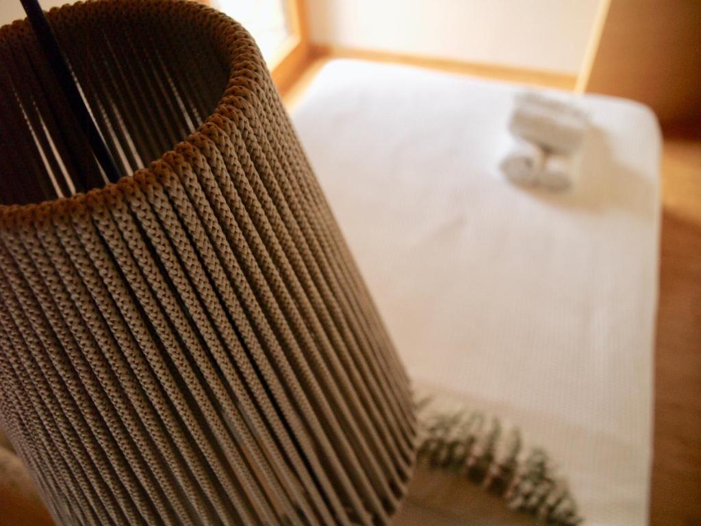A bed or beds in a room at El Corral de Baró