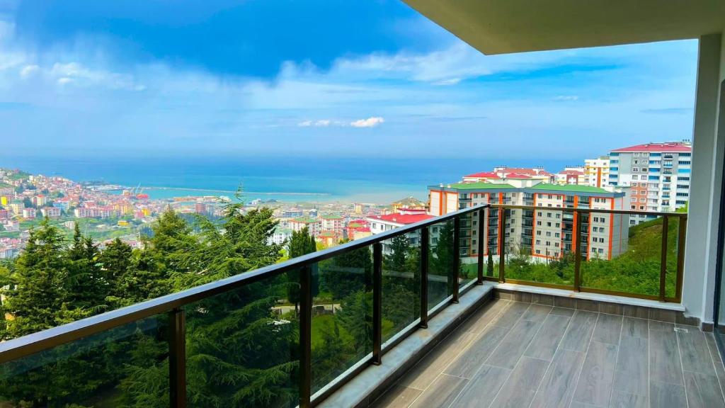 a balcony with a view of a city at Next Suite in Trabzon