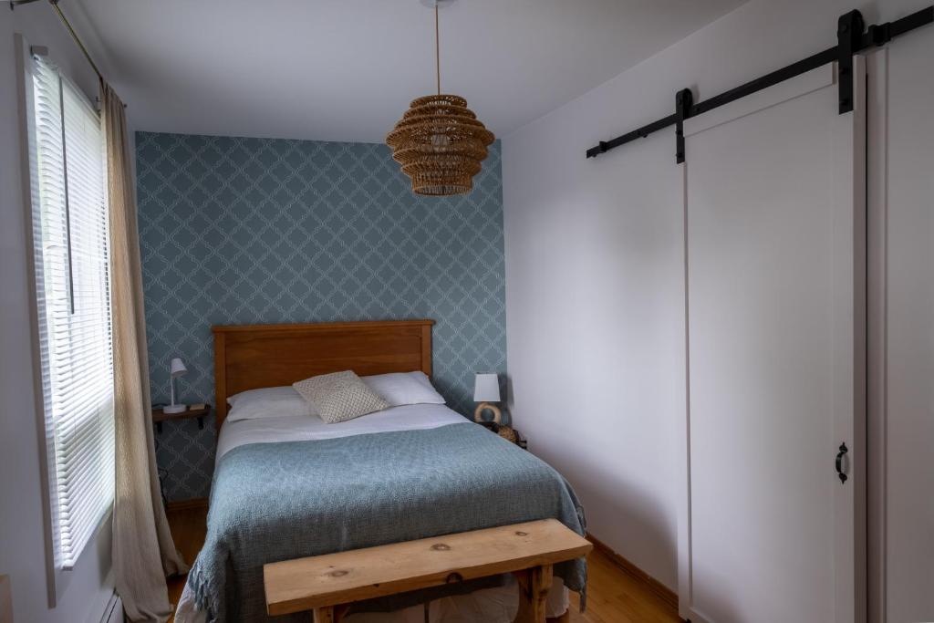 Postel nebo postele na pokoji v ubytování Au coq du bonheur