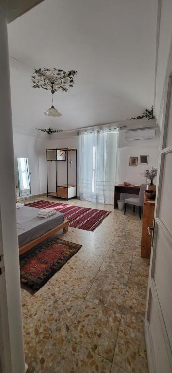 A bed or beds in a room at Casa Maravì