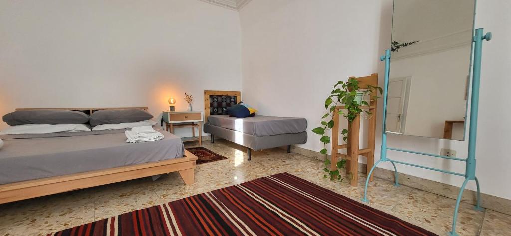 A bed or beds in a room at Casa Maravì