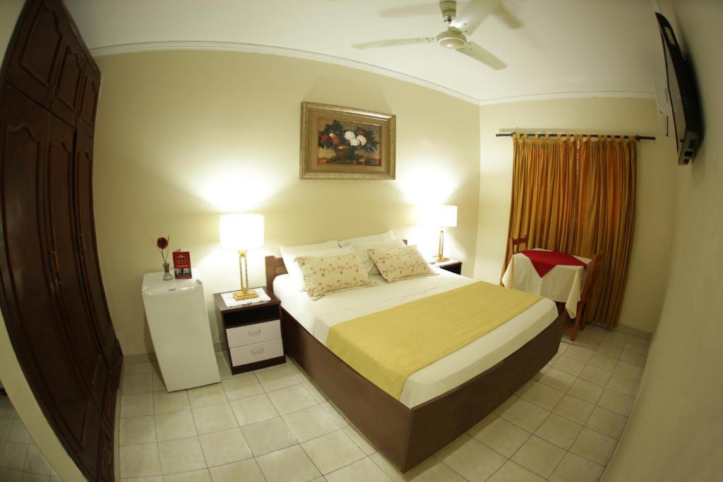 Voodi või voodid majutusasutuse Hotel del Sur toas