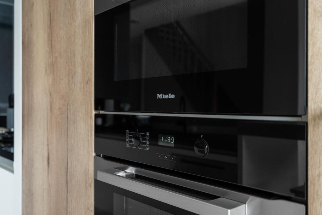 Kuchyň nebo kuchyňský kout v ubytování Maison Arthur vakantiewoning met verwarmd zwembad